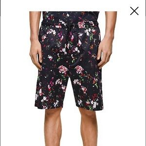Men’s diesel knee length shorts in groovy blue, pink and white floral